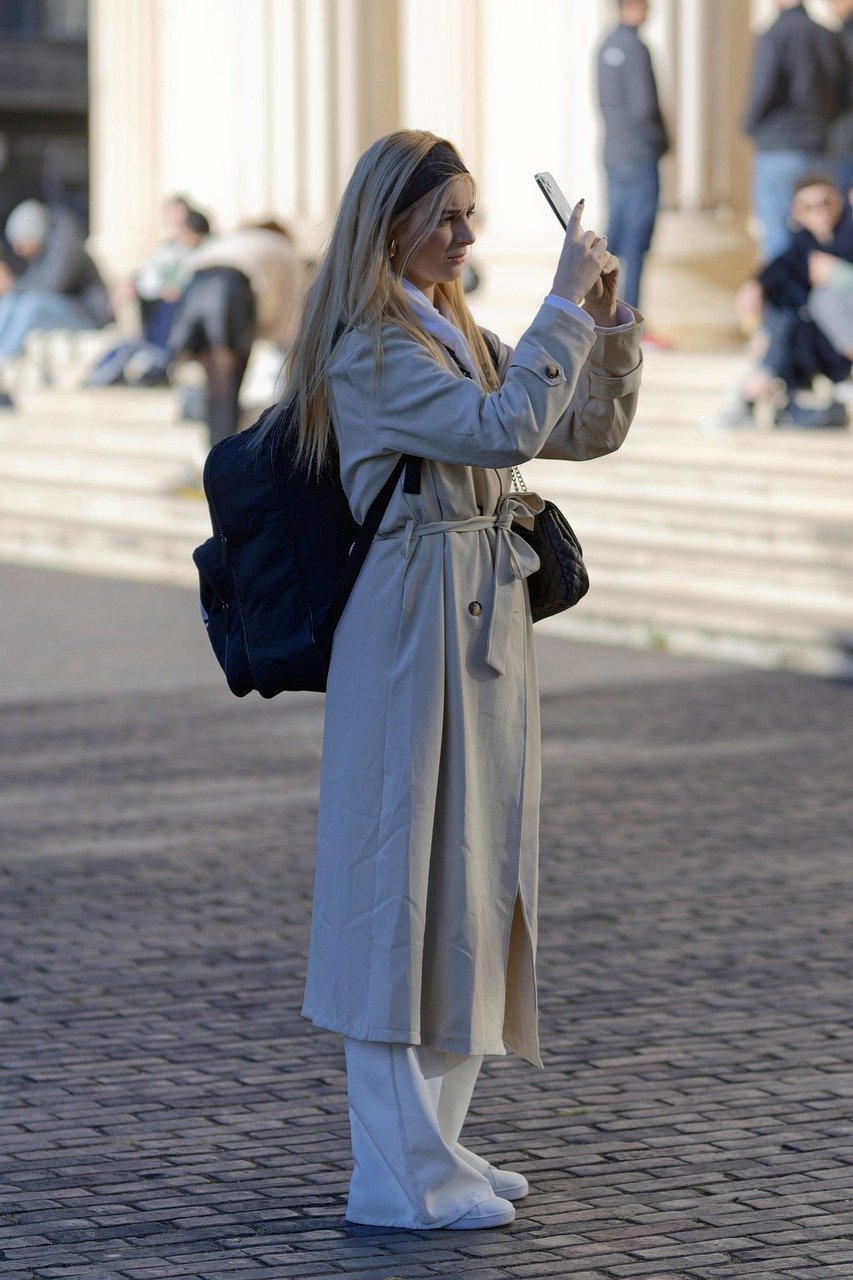 woman, young people, girl, tourist, casual, overcoat, backpack, smartphone, the street, urban, outdoor, people, scales, building